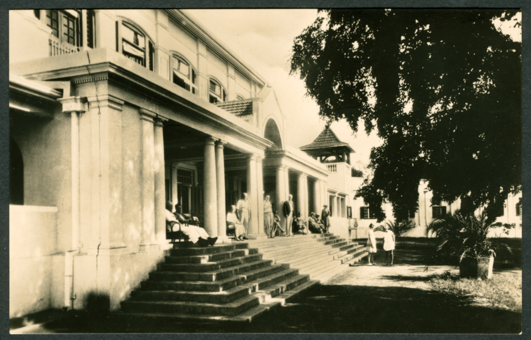 Guest on Front Porch Victoria Falls Hotel